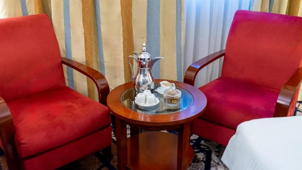 Writing desk with stationery at Al Safwah Hotel Third Tower 3.