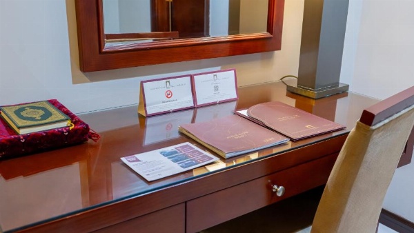 Sofa and coffee table in guest suite at Al Safwah Hotel Third Tower 3.